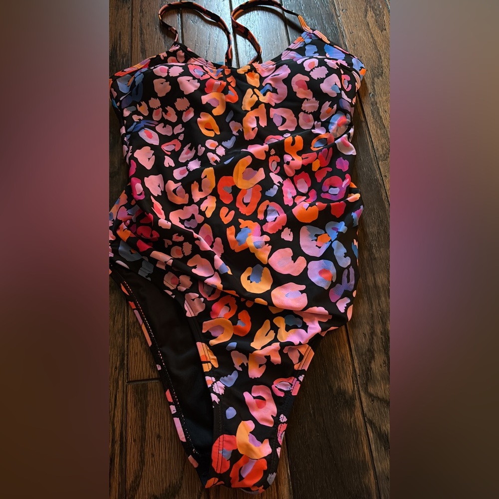 Cupshe Vibrant floral watercolors one piece with a . Peek-a-boo and O-Ring back